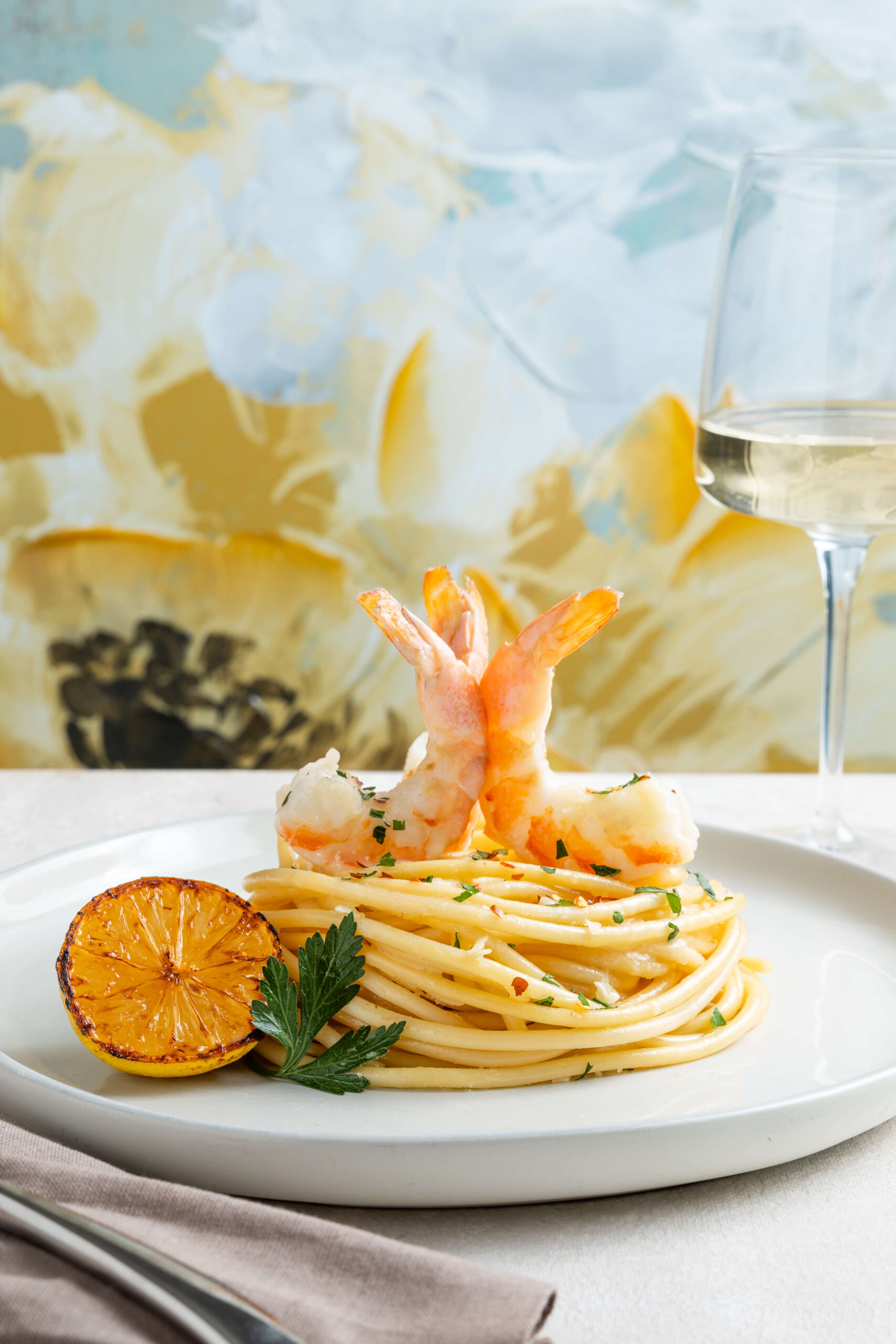 Restaurant Dish plated for Food Photography, Shrimp Scampi with wine